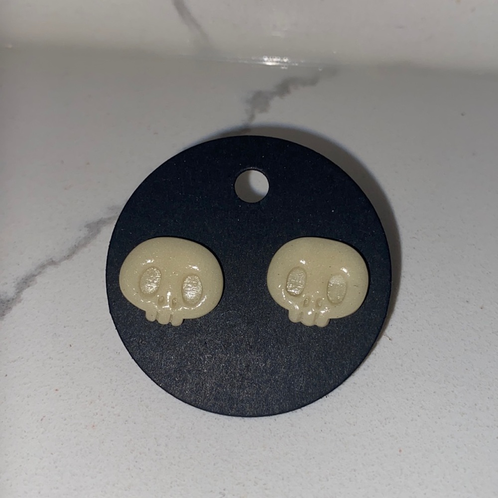 Handmade, never been worn, glow-in-dark skull shaped earrings